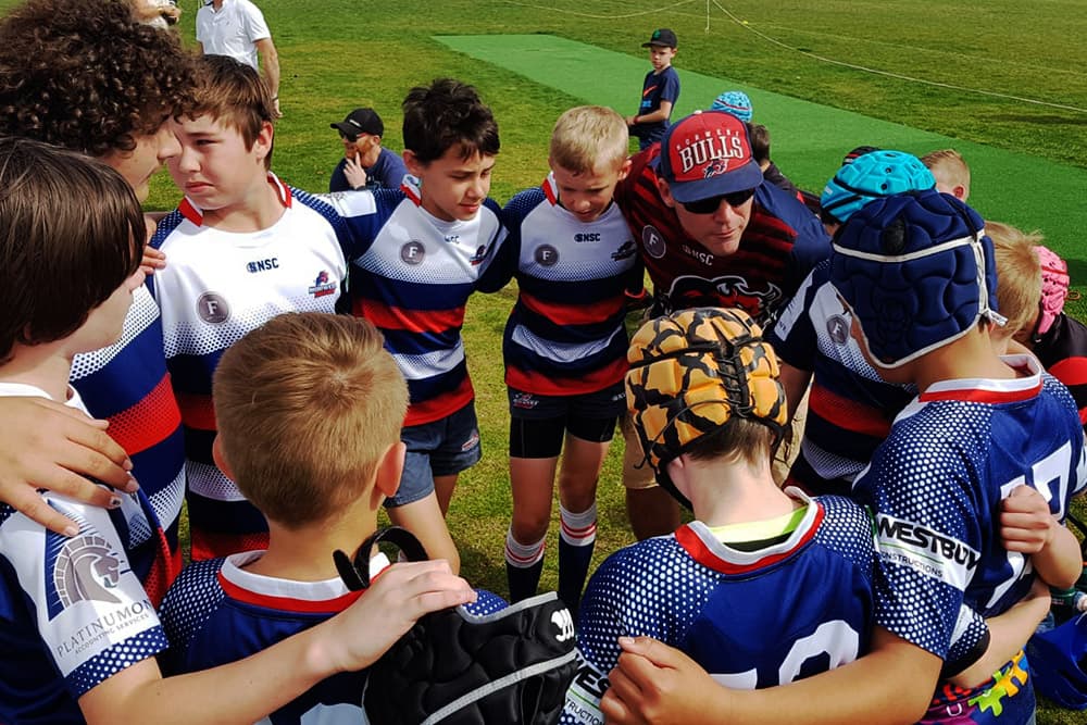 Dennis coaching the Norwest Bulls. Photo: Sourced
