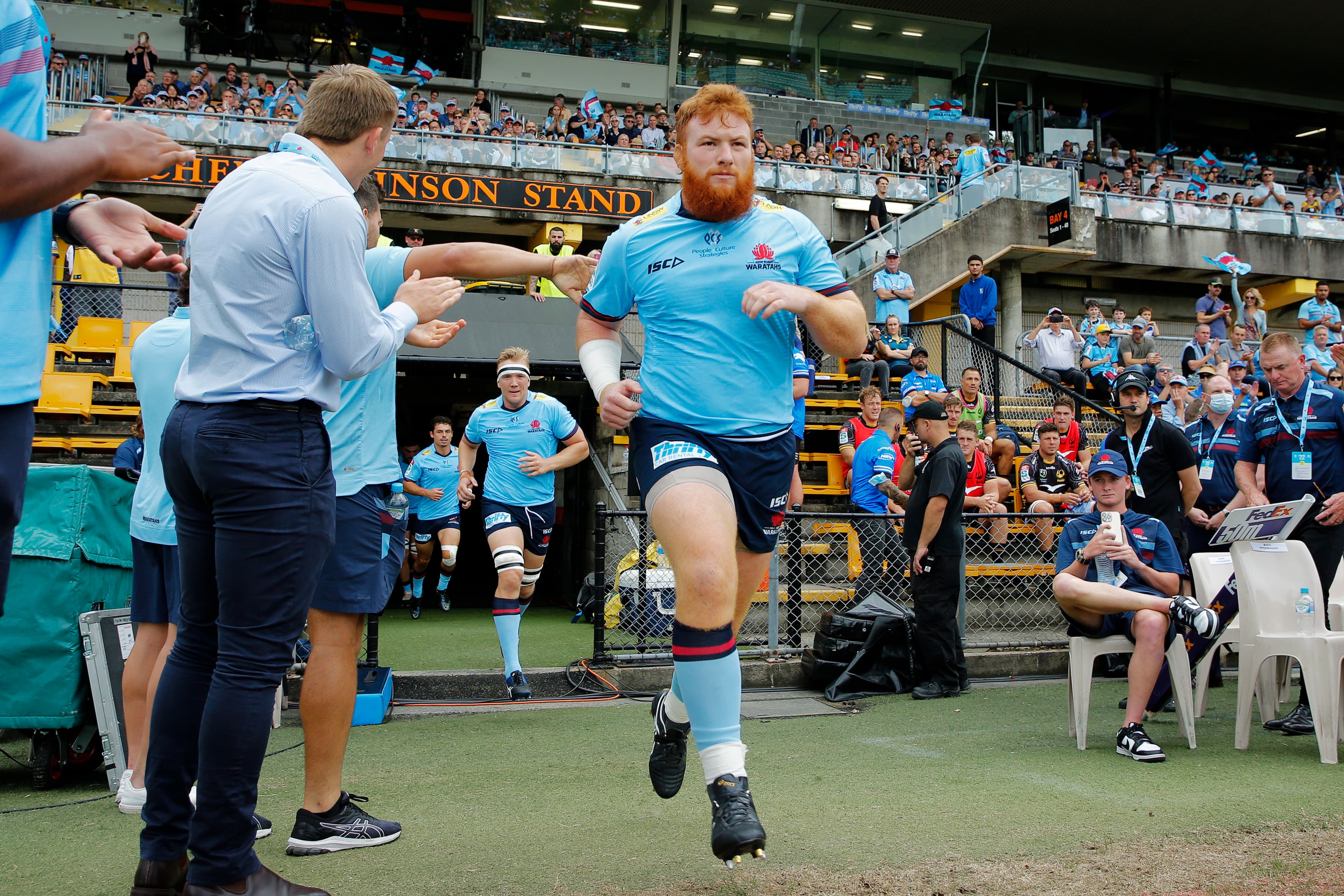 Harry Johnson-Holmes has re-signed with the NSW Waratahs