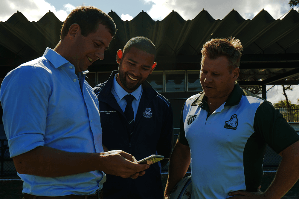 Greg Mumm guides Andrew Bobadilla and Kurt Vilo through the Positive Coaching Platform